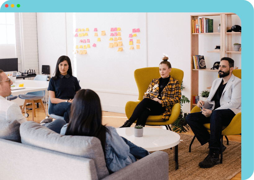 5 Young people sitting in a living room and talking